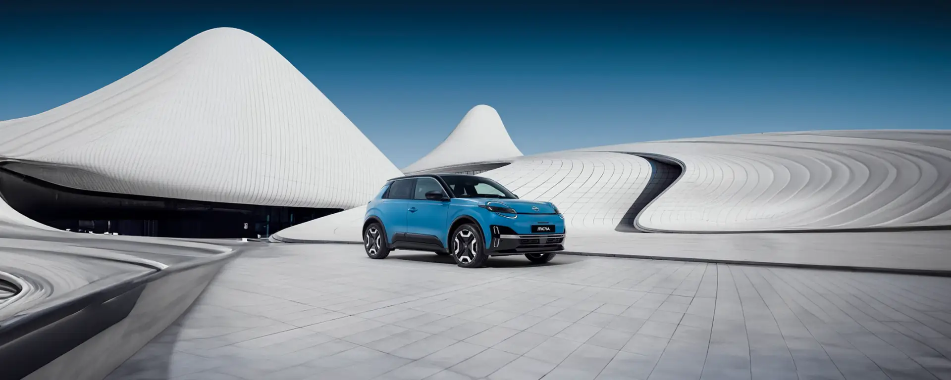 "Nuova Nissan Micra 2026 ibrida frontale sportivo - city car compatta design moderno"